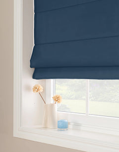 Blue room-darkening Roman blind