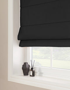 Black room-darkening Roman blind